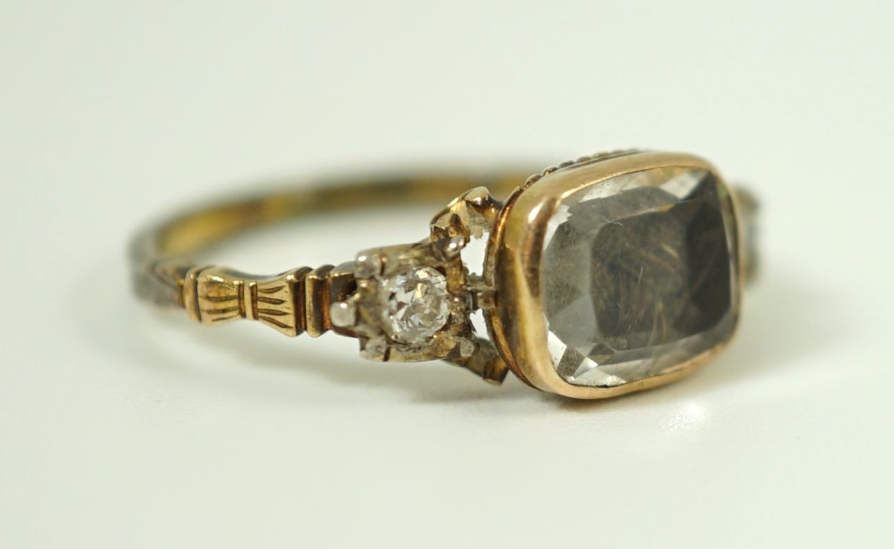 An 18th century gold and rock crystal and diamond set mourning ring